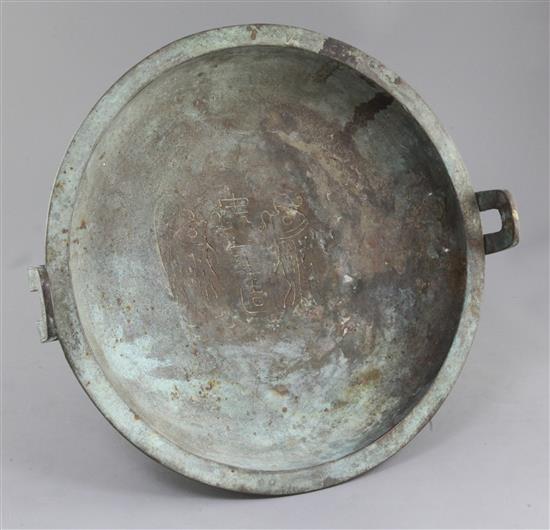 A Chinese archaic bronze ritual water basin, Pan, early Eastern Zhou dynasty, 8th-7th century B.C., 15cm high, 40.5cm, old repairs